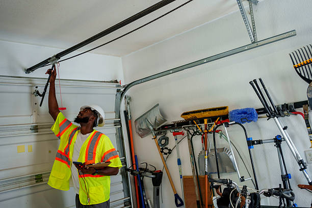 Professional Garage Door Panel Replacement technician working in Finley, WA